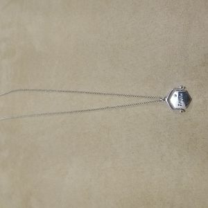 Juicy Couture silver plated flip truth & dare necklace worn once.